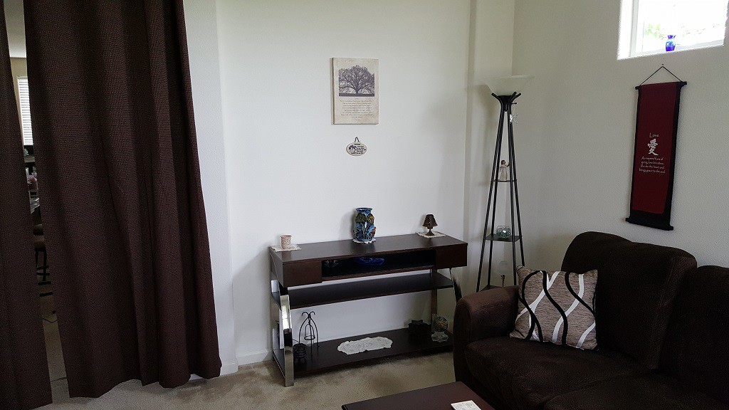 The back wall. Now it holds some of Wendy's things.